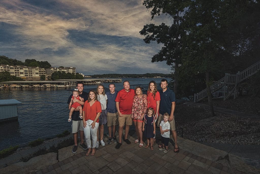Family with lake in the background