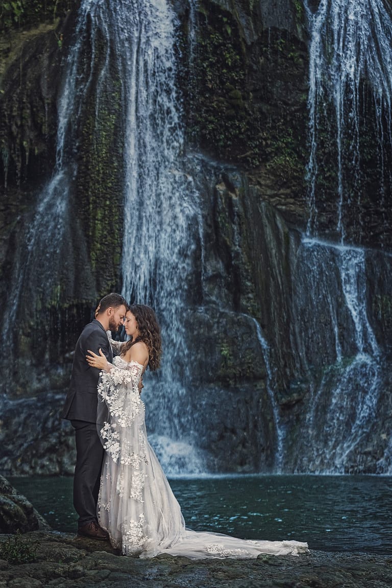 Bride and groom photo in Puerto Rico with a waterfall in background
